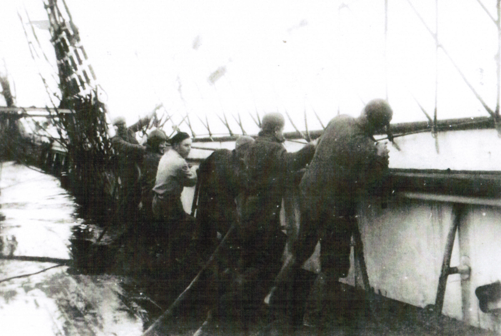 “Heaving on the Fore-Braces” (Notice water on deck amidships)