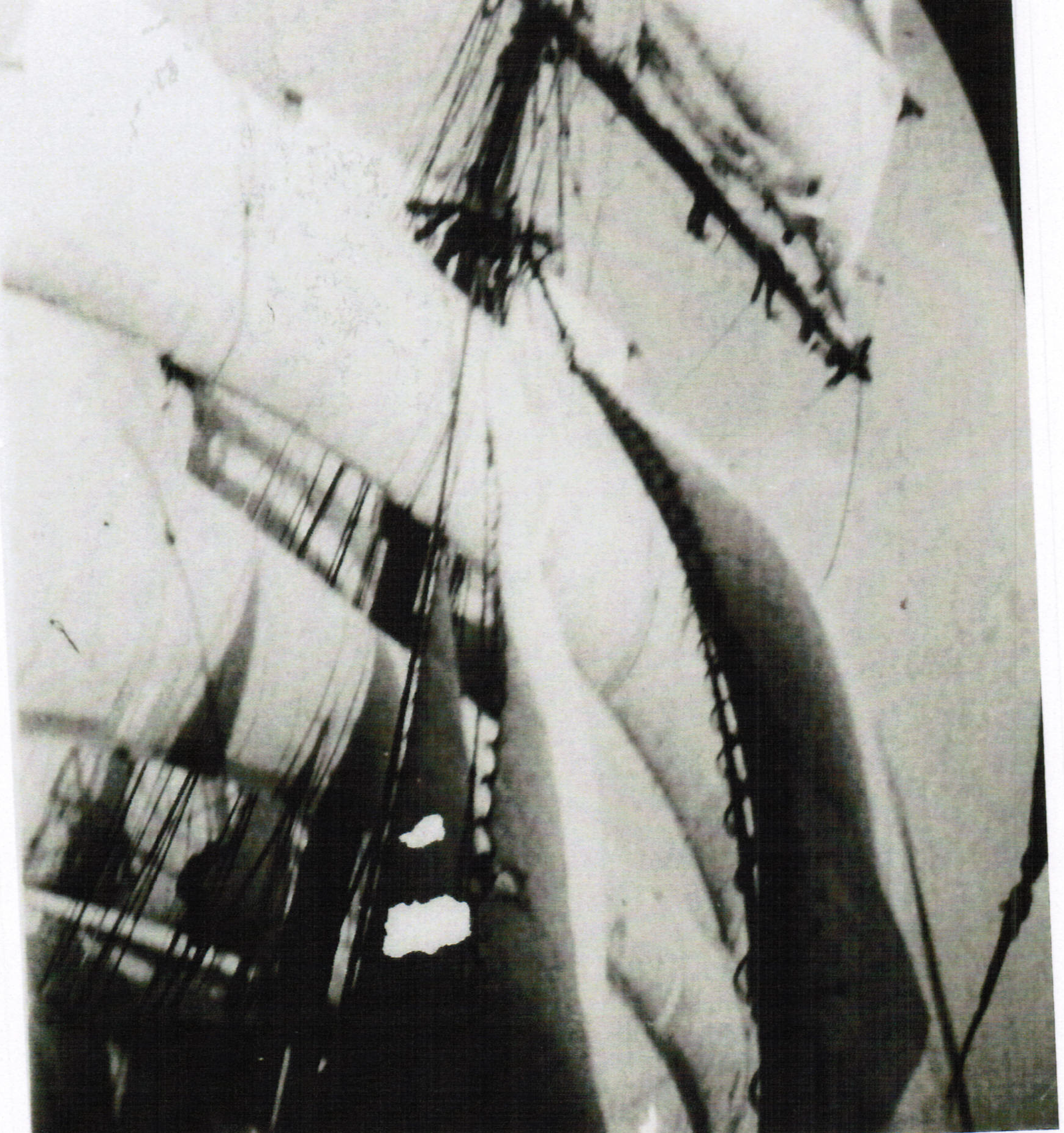 “Taking in a blown Lower T’Gallant” (Left: Sliding down the Backstay) (Right: Note four men along the yard on the footrope.)