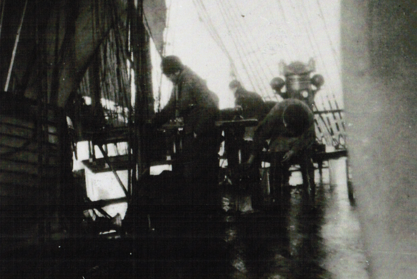 Hanlon Coventry. Scrubbing teak in cold weather. (Note Hanlon’s hand in pocket.)